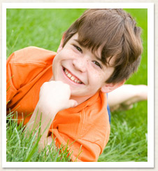 boy in orange shirt